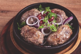 Fried apkhazura, cutlet in a fat grid, spicy, Georgian dish, fried on ketsi, homemade, no people
