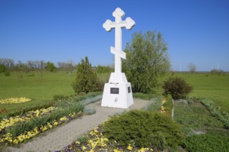 Orthodox cross on the entrance to the settlement. Krasnodar, Russia