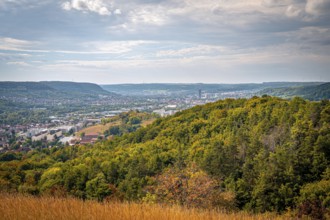View over wooded hills to the city centre of Jena, partly cloudy sky, Jena, Thuringia, Germany