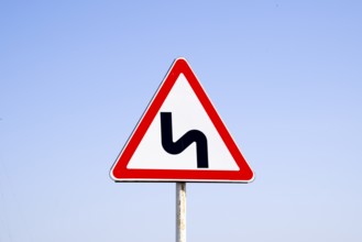 Road sign dangerous turn. Krasnodar, Russia