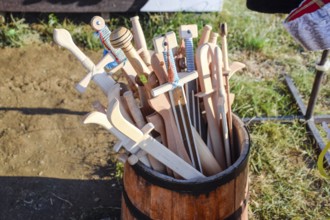 Wooden swords in a barrel. Taman, Krasnodar Krai, Russia