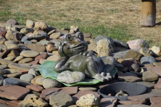 Statue of a frog on a water lily. Taman, Krasnodar Krai, Russia