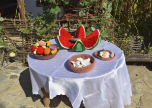 Table with dishes of the knitted fabric. Taman, Krasnodar Krai, Russia