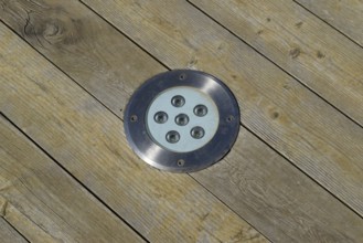 LED outdoor light for illumination, built-in wooden floor. Taman, Krasnodar Krai, Russia