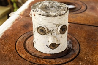 Toy souvenir from a birch log. Taman, Krasnodar Krai, Russia
