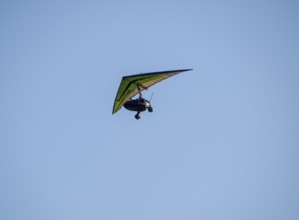 Trike, flying in the sky with two people. Extreme Entertainment travelers. Golubitskaya, Russia