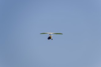 Trike, flying in the sky with two people. Atyrau, Kazakhstan