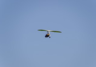 Trike, flying in the sky with two people. Atyrau, Kazakhstan