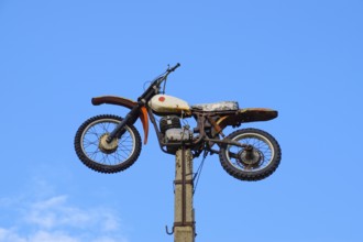 Motorcycle on the pedestal. Atyrau, Kazakhstan