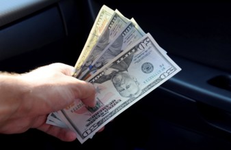Hand transmitter dollars. Atyrau, Kazakhstan
