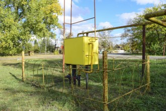 Yellow small gas distribution and regulating natural gas supply station. Atyrau, Kazakhstan