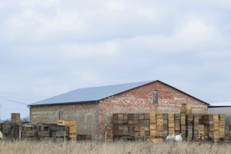 Large barn. Industrial warehouse building. Atyrau, Kazakhstan
