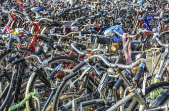 Numerous Bicycles In A Bicycle Parking Area In Amsterdam In The Netherlands
