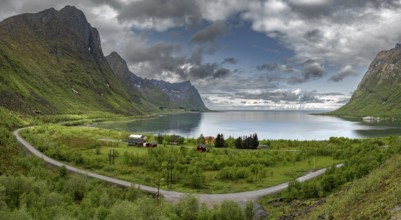 View Over Fjord With Cottages And Mountains From Bergsbotn Viewing Platform On Senja Island In