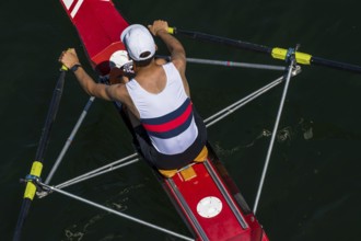 View From Above On Single Rower In Racing Boat During Training, Austria