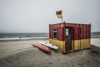 Lifeguard Station And Surfboards At Windy Brittas Bay At The Atlantic Coast in Ireland