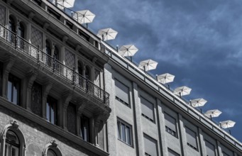 Roof Terrace With Sun Parasols On Historic And Modern Buildings In The Inner City Of Vienna In