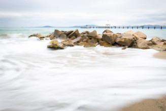 Long exposure of Seashore in Burgas city with Burgas bridge in the background. Bulgaria