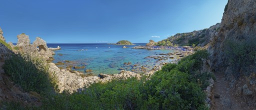 Grande Blue coastal landscape with rocks and clear blue sea in the background, sunny and quiet,