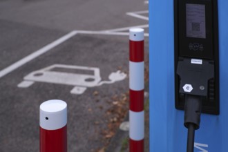 Car park with petrol pump, EnBW charging station for electric cars, electric filling station,
