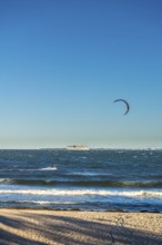 Kitesurfing in the Bay of Kiel in strong winds, high swell, Strande near Kiel,