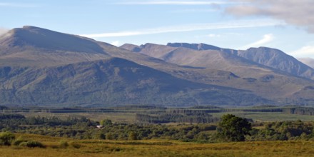 Vast mountain landscape with wooded hills and clear skies, Highlands, Ben Nevis, Scotland, Great