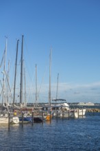 Strande marina near Kiel, Rendsburg-Eckernförde district, AIDA, ship masts, dolphins, Baltic Sea,
