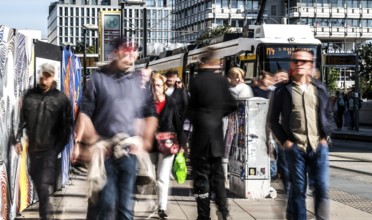 A long exposure shows people at a tram stop at Alexanderplatz, Berlin, 27/09/2025, Berlin, Berlin,