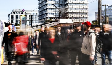 A long exposure shows people at a tram stop at Alexanderplatz, Berlin, 27/09/2025, Berlin, Berlin,