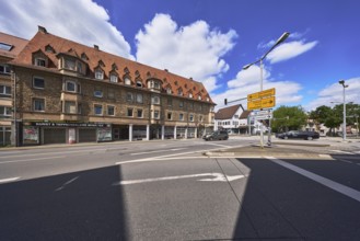 Building, general architecture, carpet shop, shopping, traffic light crossing, lantern, signpost,