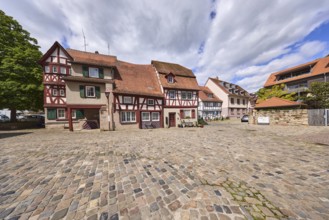 Old town, historic half-timbered houses, building, pointed roof with red roof tiles, cobblestone