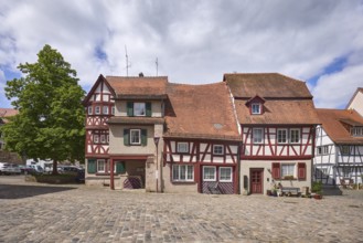 Old town, historic half-timbered houses, buildings, pointed roof with red roof tiles, cobblestone