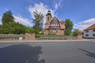 Chapel of the motherhouse St. Vinzent, tower, tower clock, trees, blue sky, cumulus clouds,