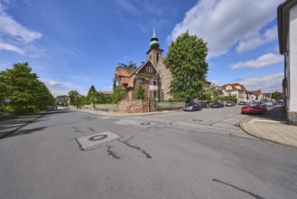Chapel of the motherhouse St. Vinzent, general architecture, trees, car park with vehicles, blue