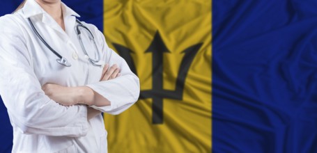 Doctor with crossed arms on Barbados flag. Barbados health and care concept. Female doctor on