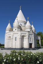 Magnificent temple with white domes surrounded by rose garden, Yazidi temple, Yazidi temple, the