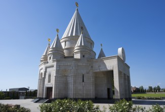 White temple with high towers and arches in front of a clear sky, Yazidi temple, Yazidi temple, the