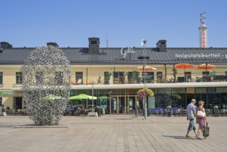 Passers-by, street scene, Lasipalatsi shopping centre, Narinkkatori, Helsinki, Finland