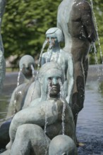 Fountain, art installation by Nina Beier, woman and children, Mannerheimintie, Helsinki, Finland
