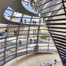 Interior view of the Reichstag dome with mirror cone and visitors, Reichstag building, landmark,