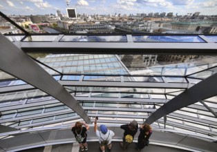 Interior view of the Reichstag dome with visitors on the ramp and view of the cityscape, Reichstag