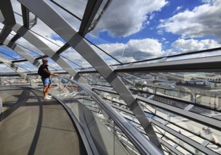 Interior view of the Reichstag dome with visitors on the ramp leading to the top, Reichstag