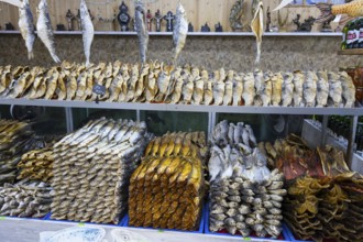 Different types of fish are neatly stacked on a shelf in a fish market, fish sale, Tsovagyugh, Lake