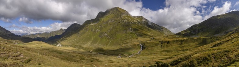 View from Passo del Sole to Passo dell'Uomo with waterfall, Alpe Carorescio with Piano Grande