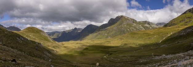 Panorama from Passo del Sole to Passo dell'Uomo and Alpe Carorescio with Piano Grande plateau,