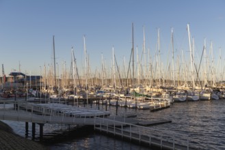 Olympic harbour Schilksee, Olympic Games 1972, sailing yachts at the jetty, ship masts, evening