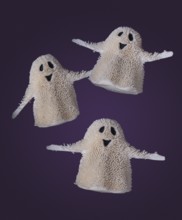 Three funny ghosts are flying on a purple background