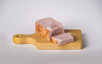 Smoked bacon on wooden board, copy space