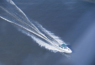 A speedboat moves along the Volga River, selective focus, Nizhny Novgorod, Russia