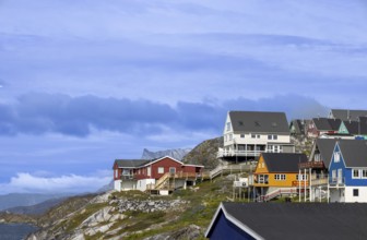 Panoramic view of Greenland capital Nuuk with colored houses located near fjords and icebergs